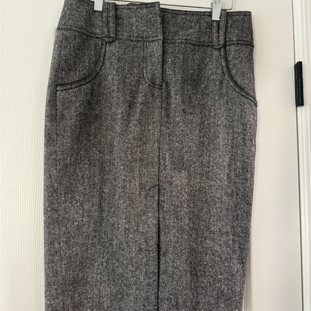 NWOT gorgeous Bebe skirt with leathery trim.
